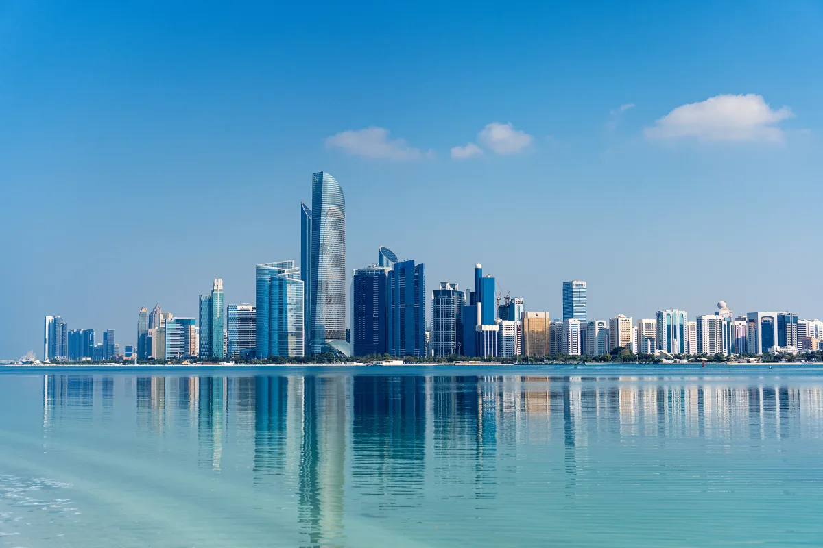 The Abu Dhabi skyline across the water on a clear day