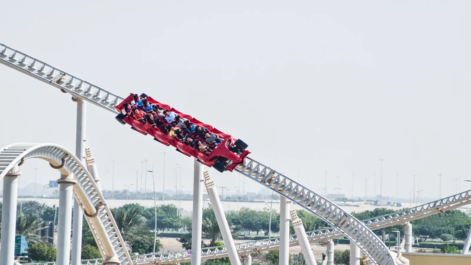Visitor enjoying an exciting ride at Ferrari World Abu Dhabi on Yas Island