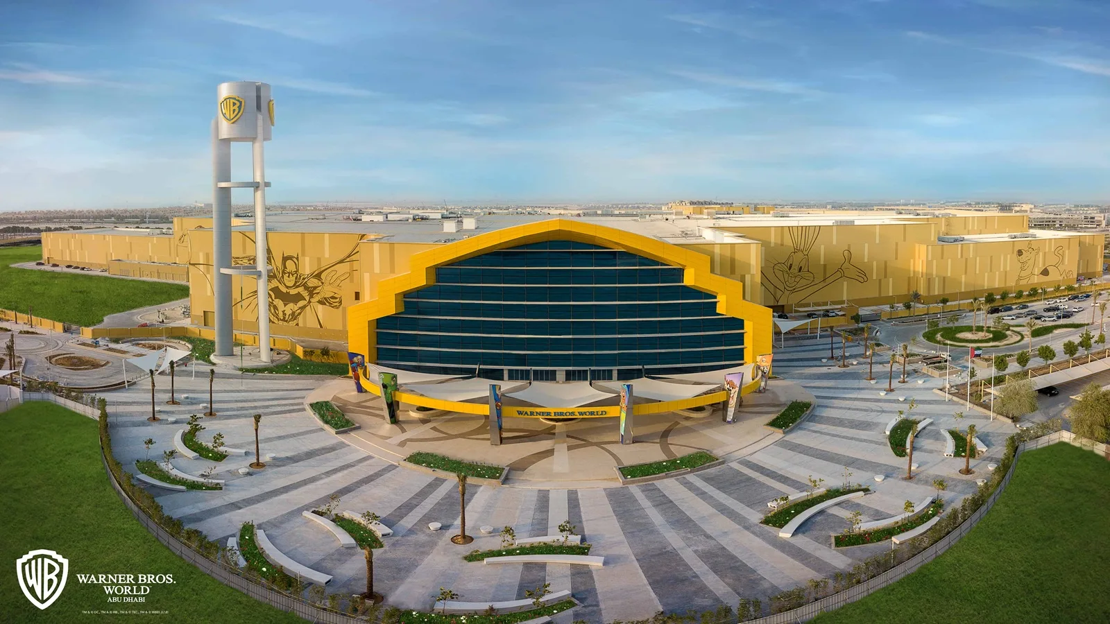 Aerial view of Warner Bros. World Abu Dhabi theme park and surrounding attractions on Yas Island