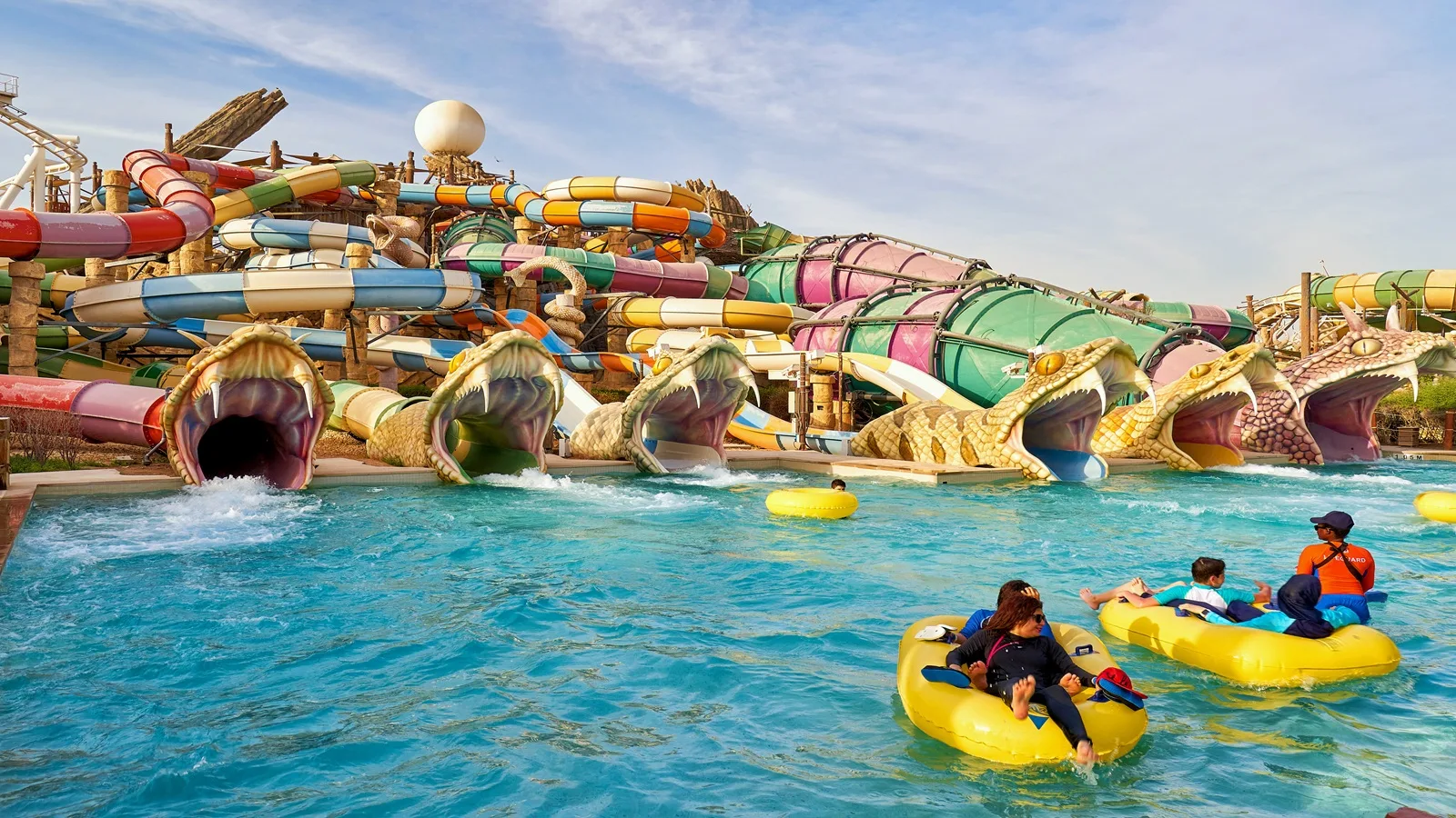 Visitors enjoying an exciting water ride at Yas Waterworld Abu Dhabi