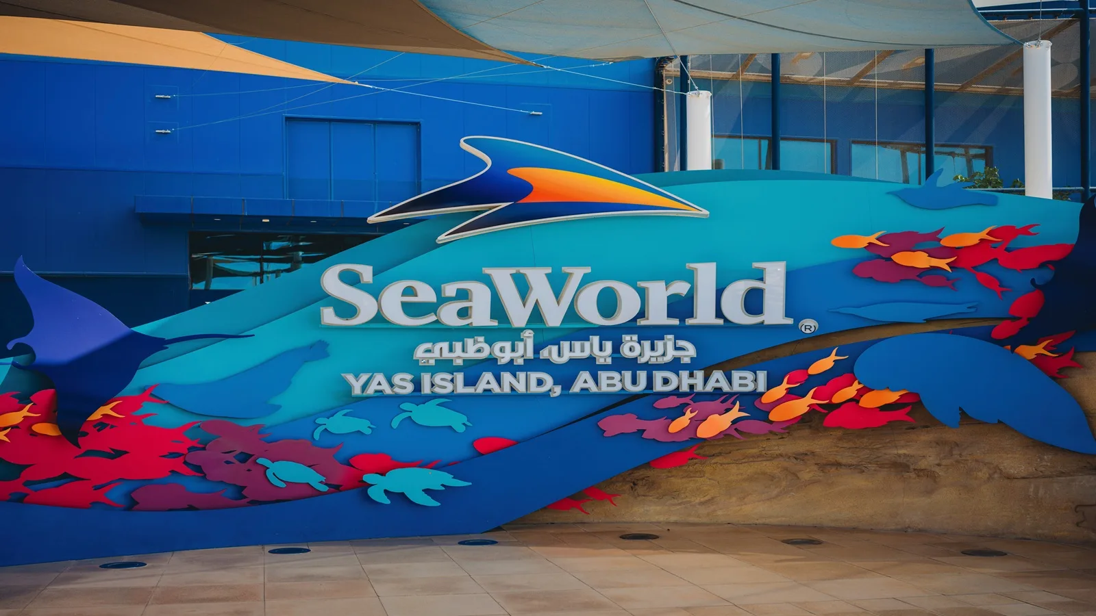 Visitors exploring marine-life exhibits and immersive ocean attractions at SeaWorld Yas Island Abu Dhabi