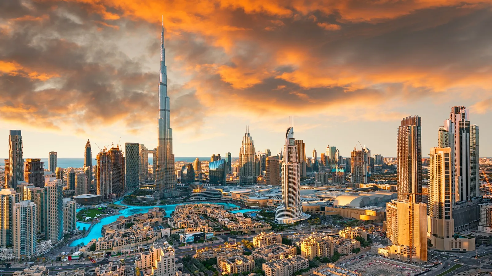 Burj Khalifa towering over Downtown Dubai with the modern city skyline in the background